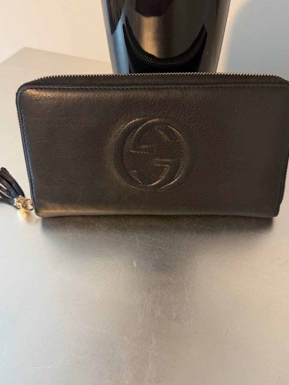 Gucci Black Leather Zip Wallet with Embossed Interlocking G